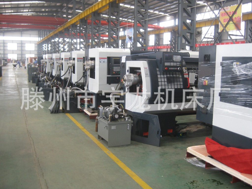 大型数控斜床身数控车床、通过CE认证.可选配自动排销系统。