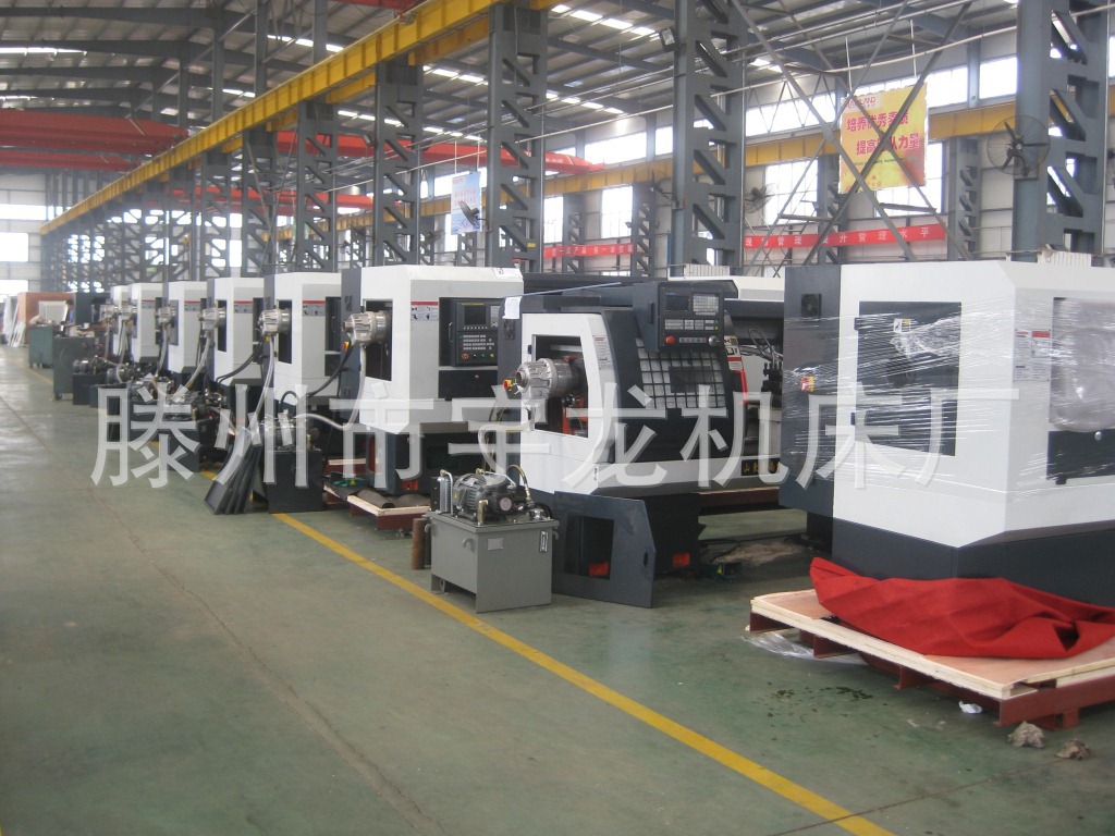 大型数控斜床身数控车床、通过CE认证.可选配自动排销系统。