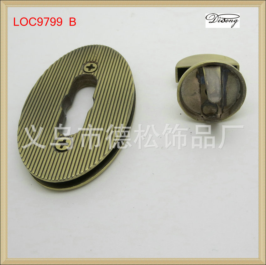 箱包五金工厂专业生产合金箱包锁,古铜色电镀椭圆合金包锁