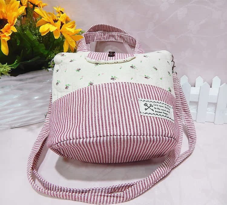 豎條紋花朵雙扣單拉手提斜挎包11