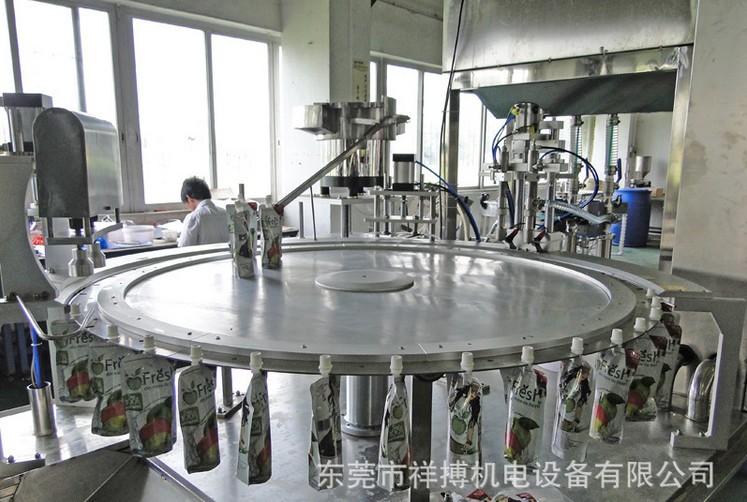 供应全自动自立袋灌装旋盖机,豆浆自立袋灌装机,吸嘴袋灌装机