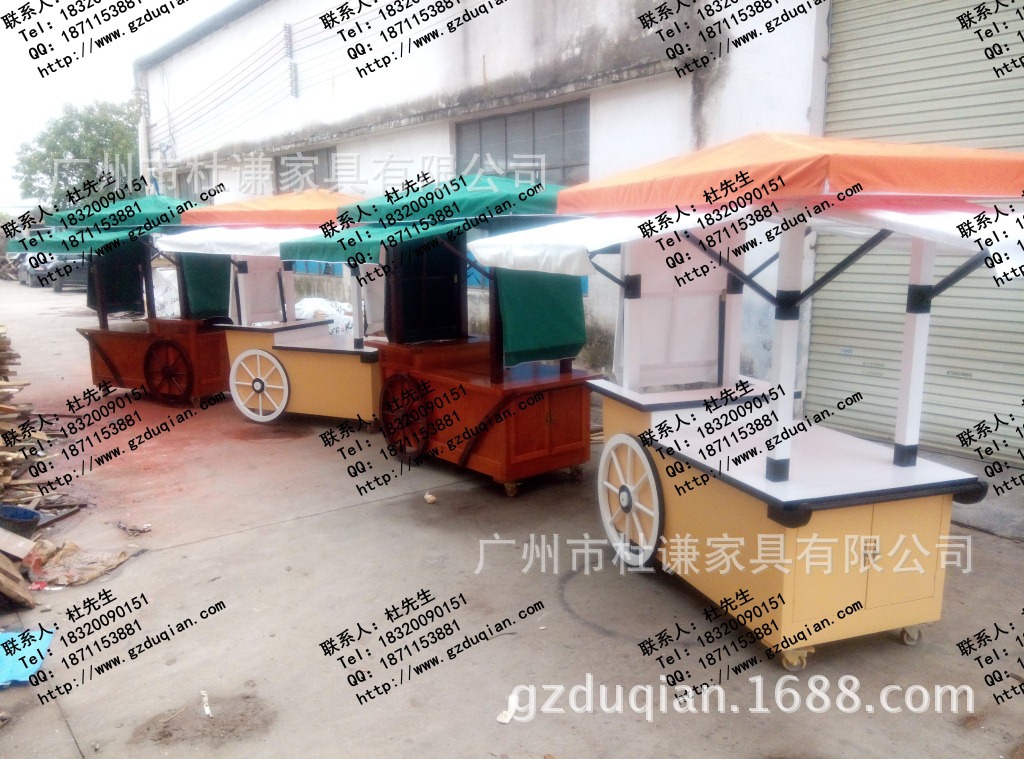 流动售货车 饰品流动售货车,水果移动手推车,街道食品木制售货亭仿高清图片