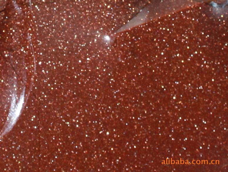 金星石是通过原料选配,调剂,烧制而成的一种人造宝石