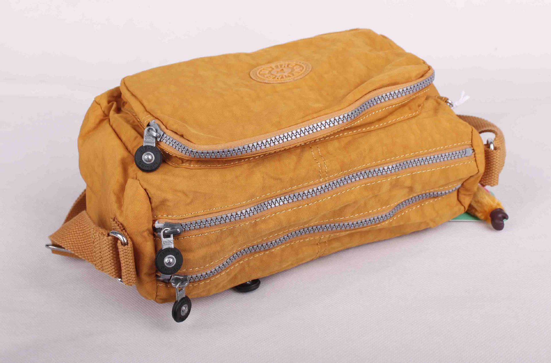 供应今年新款 kipling 吉普林2020 黄色斜跨包