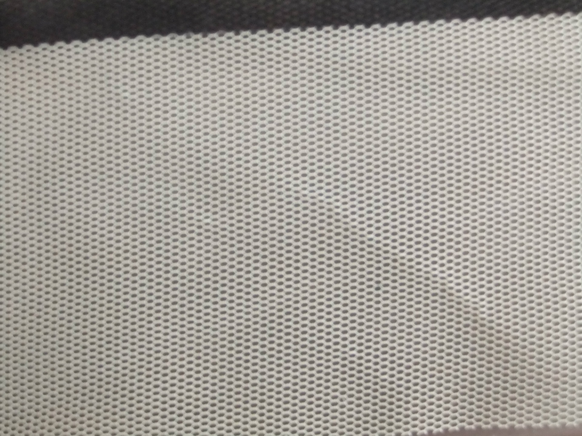 产品中心 针织面料 > 涤纶六角网布 品名:六角网眼布 经纬编:经编