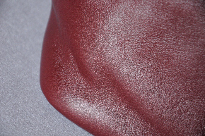 高端 植鞣革树膏/树羔皮优等头层牛皮抽绳手提单肩斜挎包