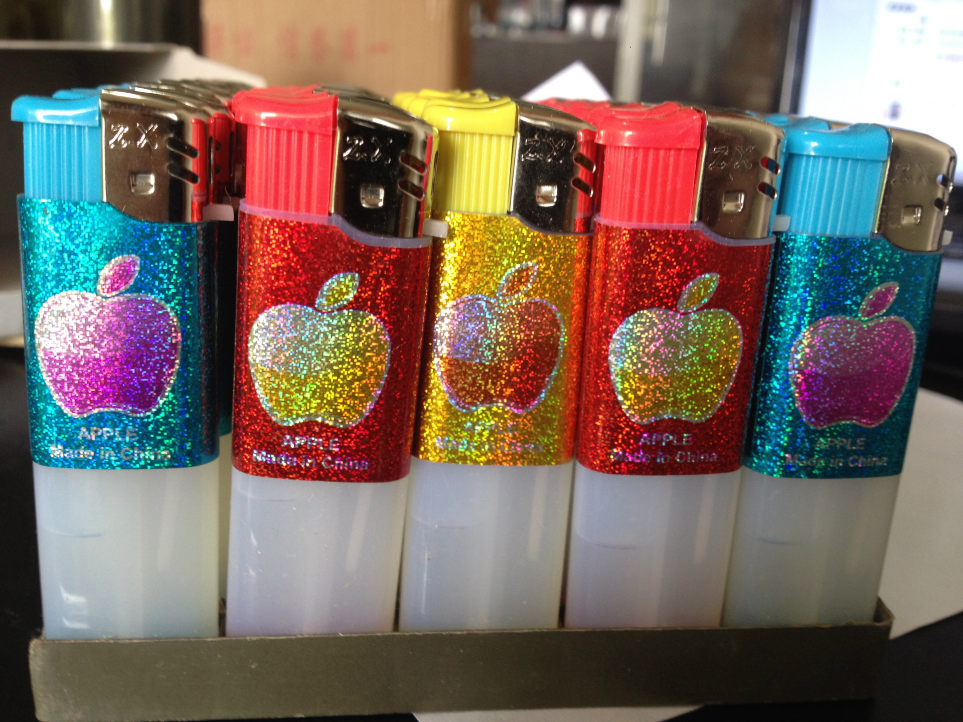 供应擂射909型半包纸半透明打火机 厂家直销