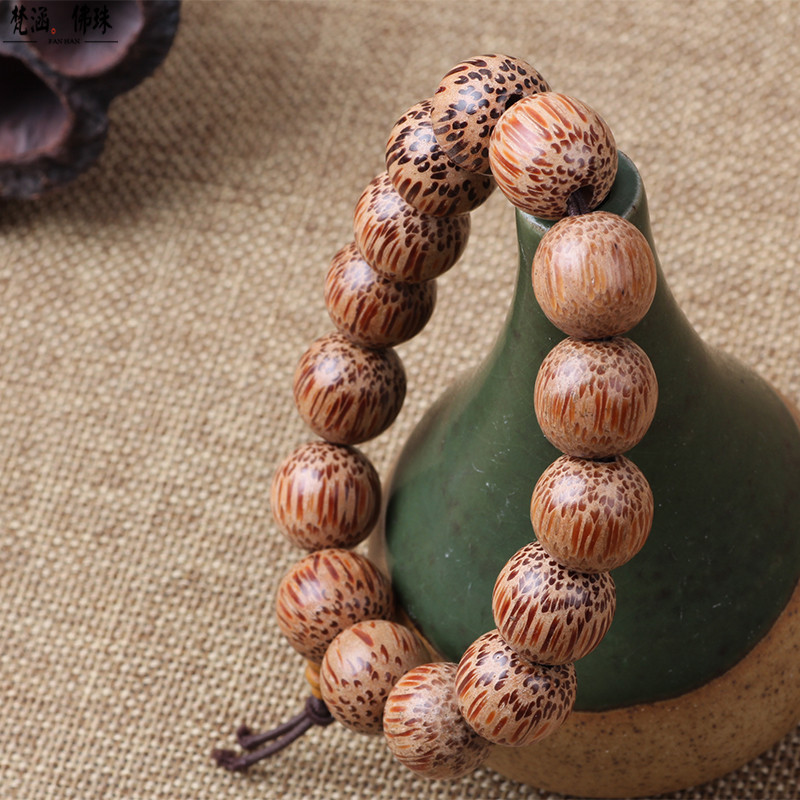 【品名】:天然蛇皮纹椰木佛珠手串 【材质】:椰子木 【规格】:10mm20