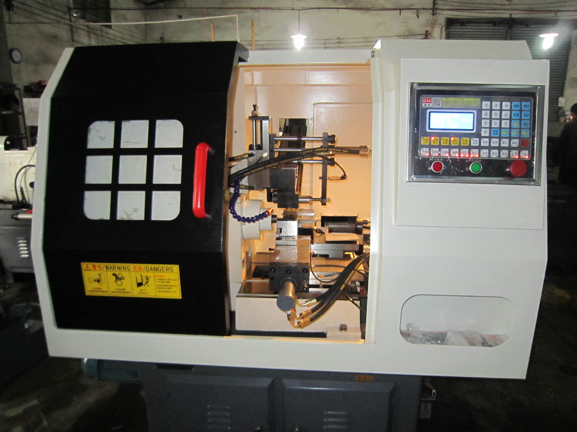 自动前送料液压自动车床